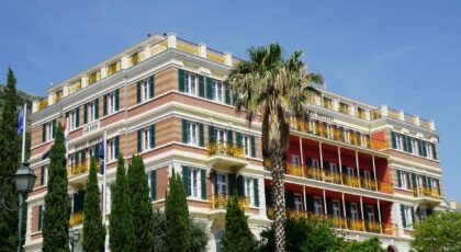 Stunning exterior view of the Hilton Imperial Hotel with vibrant balconies in Dubrovnik.