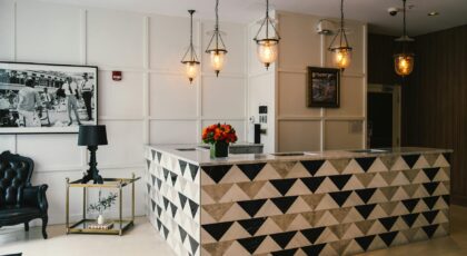 Explore the elegant reception area of a Miami Beach boutique hotel, showcasing modern coastal design and vibrant decor.