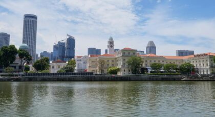 Enjoy the stunning Singapore skyline with iconic landmarks and modern architecture along a tranquil waterfront.