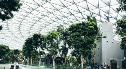 Explore the lush indoor garden and iconic architecture at Jewel Changi Airport in Singapore.